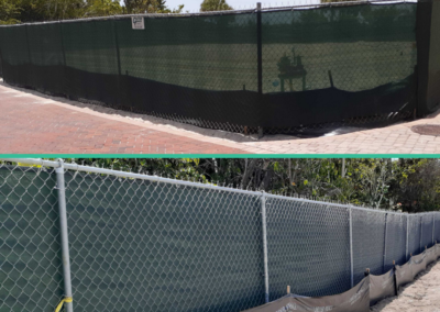 Construction Fence with green windscreen_Bay Colony Dr, Naples, Fl_Carter Fence