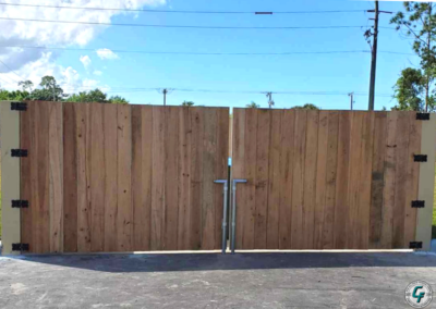 Pressure treated pine wood_Stockade dumpster gates, 6’H x 16’W_6 Mile Cypress Pkwy, Fort Myers Fl_Carter Fence