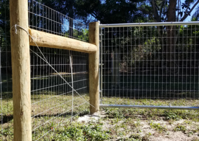 woven wire and wooden posts-Style Field Fence – 4’H-North Road, Naples, Fl 34104-Carter Fence